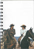 (Graphic Only) White cover with an Image of 2 People Horseback Riding
