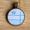 Book Lover Necklace -- DATE DUE (dk blue)