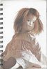 (Graphic Only) White Cover with an Image of a Porcelain Doll